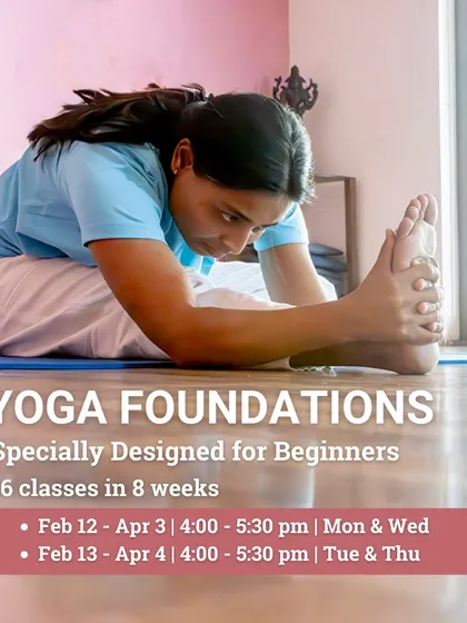 This image from our beginner's course shows a student in Paschimottanasana (Seated Forward Bend), a posture that calms the brain and stretches the entire back of the body.