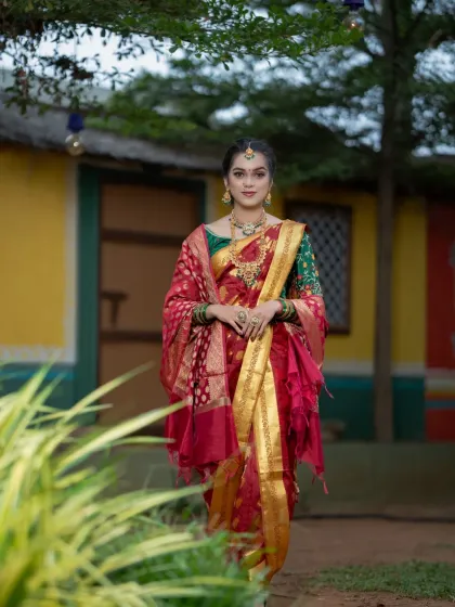 A full-length view of the Marathi look, showcasing the unique saree drape and traditional jewellery.