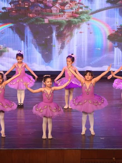 The enchanting ballet performance from our annual showcase. Dressed in beautiful purple tutus, our young dancers brought a storybook world to life with their coordinated movements and charming stage presence.