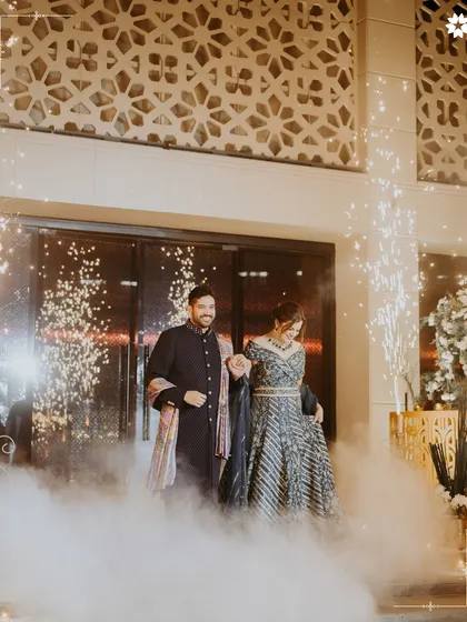 A couple's grand entrance, enveloped in a cloud of celebration. We orchestrate these key moments with precision and a touch of magic, using elements like cold pyrotechnics to ensure the start of your reception is as unforgettable as the vows themselves.