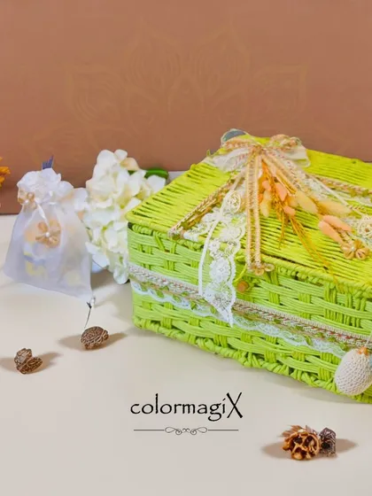 Our vibrant green jute hamper is a unique gift for Diwali. Adorned with delicate lace, dried flowers, and crochet charms, it offers a refreshing and eco-chic alternative for festive gifting.