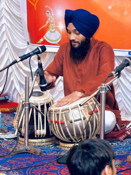 A close-up shot from my solo performance in Mumbai. The microphones are set to capture the distinct sounds of the dayan and bayan.