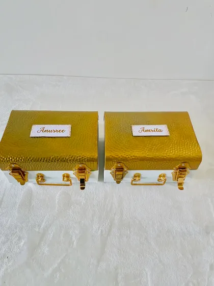 I can personalize these beautiful metal trunks with names for a truly special gift. Here are two prepared for Anusree and Amrita, ready to be filled with goodies.