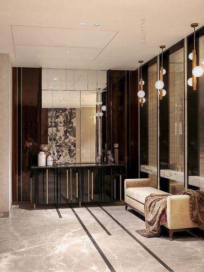 It’s always the unexpected spots that surprise us. This foyer area turned out to be one of the most grounded, welcoming parts of the project, with its rich wood tones and comfortable bench.