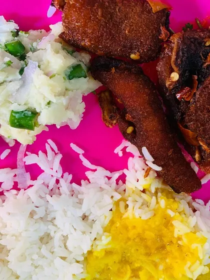 My meal of spicy beef skin curry served with a simple potato chutney, dal, and rice. The mashed potato chutney is a great cooling contrast to the spicy beef.