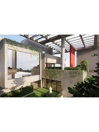 The internal view of the "Bounding Box" residence emphasizes the connection between indoor spaces and the large, framed openings to the outside. This creates a sense of spaciousness and brings ample natural light into the home.