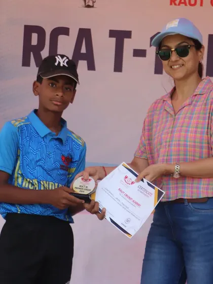 A player receiving his award at the RCA T-10 Premier League 2024 ceremony.