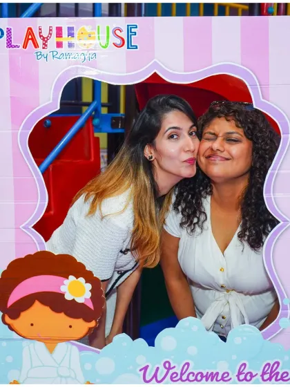 Even the adults get in on the fun, posing with our themed photo props at the pamper party.