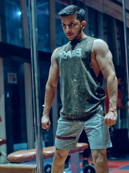 You are stronger than you think. A post-workout pose showing the results of a solid training session.