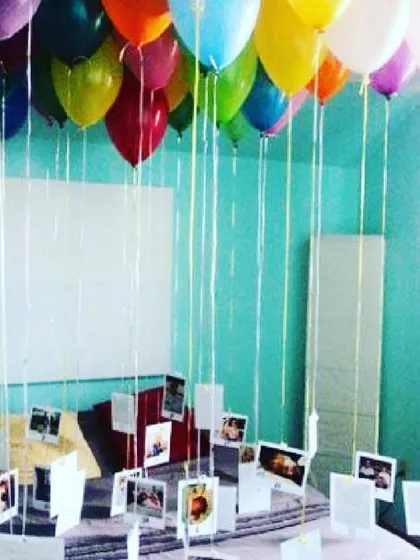 Relive your best moments with a personalized memory string decoration. I hang your favorite photos from colorful balloons, creating a floating gallery that adds a deeply personal and heartfelt touch to any celebration.