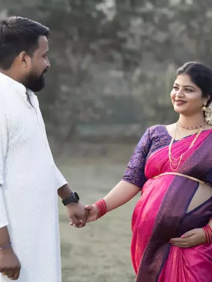 Celebrating your journey with traditional elegance is always special. Here, I captured a quiet, romantic moment between the couple during their outdoor maternity shoot, with the beautiful silk saree adding a timeless grace to the photograph.