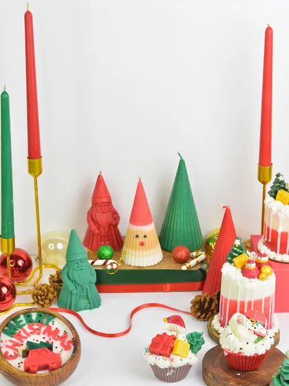 My full Christmas Collection is here to light up your festivities, featuring cake candles, taper candles, Santa candles, and more.