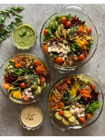 A top-down view of our Earthy Malabar Salad Bowls, ready for delivery. Each bowl is a soulful mix of cumin-spiced taro, sweet potato, and fresh greens, capturing the essence of the Malabar coast.