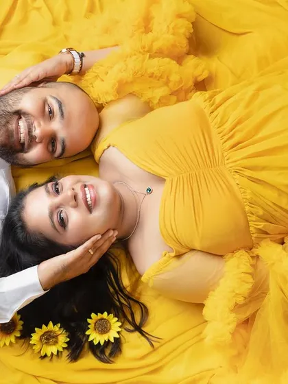 This is what pure happiness looks like. I love this unique top-down perspective for couple maternity sessions. It captures the intimate bond and shared excitement as you both look forward to your new beginning.