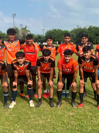 Our senior team posing for a photo after a friendly match. These games help maintain match fitness and team chemistry.