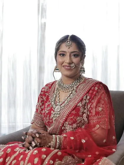 This portrait showcases how the makeup looks in natural light. The skin appears fresh and not heavy, and the features are beautifully defined.