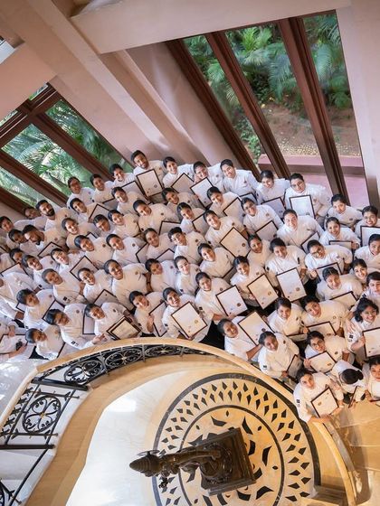 A unique perspective of our graduating Batch 20, holding their hard-earned diplomas. A testament to their dedication and the start of their professional journey.