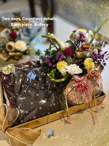Two days and countless details went into this 'ZarGul' hamper. It features a beautifully packaged shirt for the groom alongside dry fruits and a lush floral arrangement, telling a story of love and craftsmanship.