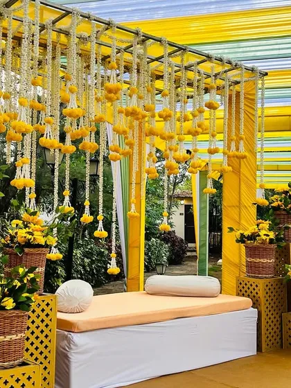 A closer look at the Haldi seating area, with its clean lines, traditional flowers, and vibrant color scheme.
