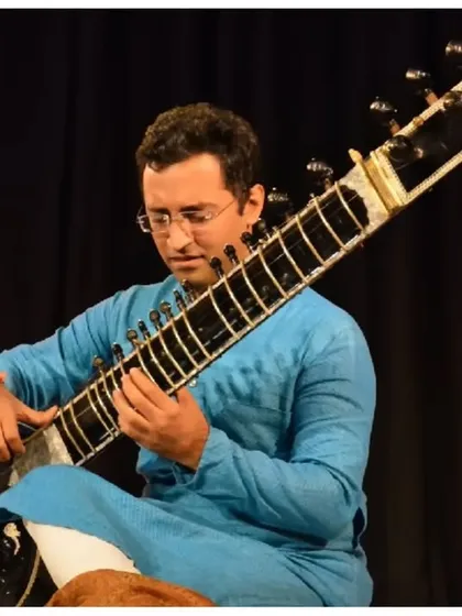 A focused moment during my sitar recital at the prestigious India International Centre (IIC) in Delhi. I am available for solo performances at cultural festivals and venues.