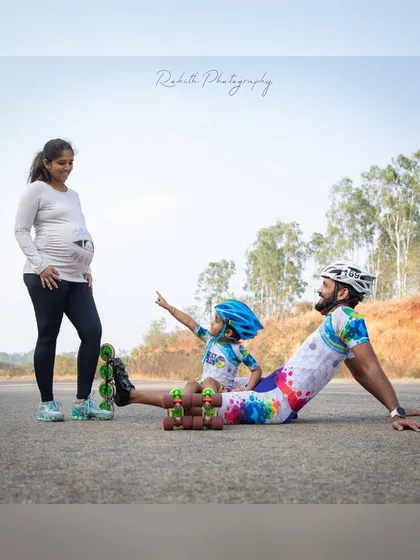 Our skating family is growing. A special moment from our maternity photoshoot, with our daughter pointing to the future, excited for her new partner in crime.