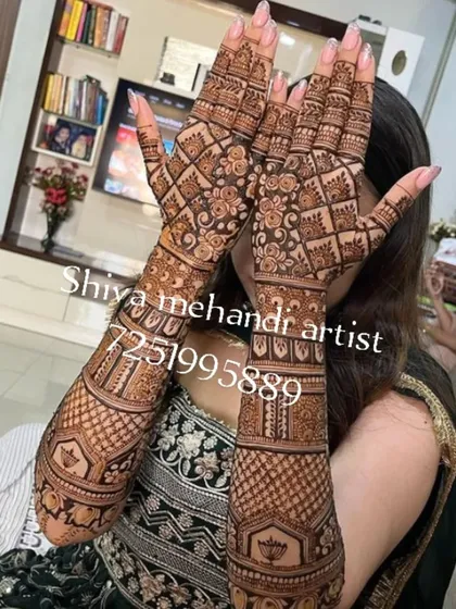 This full-arm mehendi showcases my skill in creating dense, intricate patterns. The design features a combination of classic jaali (net) work and delicate floral motifs for a rich and traditional look.