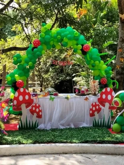 We create imaginative worlds for our youngest clients. This jungle-themed birthday party features a custom balloon arch, whimsical mushroom cutouts, and a fully styled dessert table, transporting kids to an enchanted forest for a day of fun.