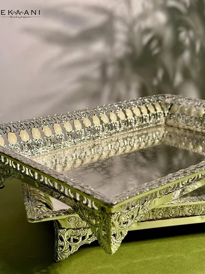 Timeless charm in every detail. These rectangular silver-plated serving trays, with delicate beige enamel, add a refined touch to your hosting and decor.
