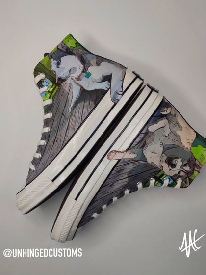 A custom pair of Chuck 70s for a client featuring portraits of their two beautiful huskies, Loki and Blue.