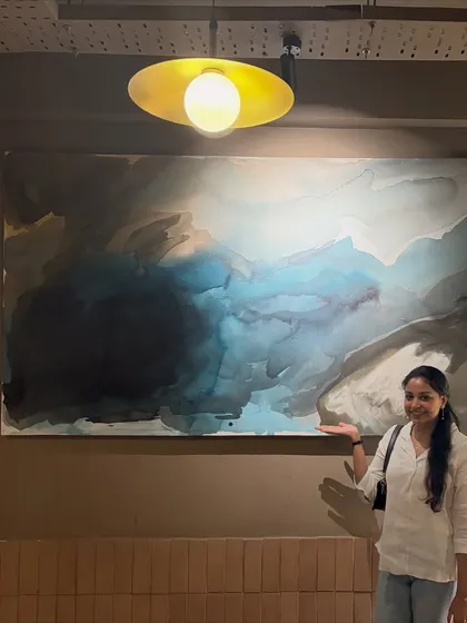 This was such a happy moment for me, seeing my first ever giant 8ft x 4ft piece installed at Sidewalk in Lucknow. This fluid art painting became a major feature of the cafe's decor.