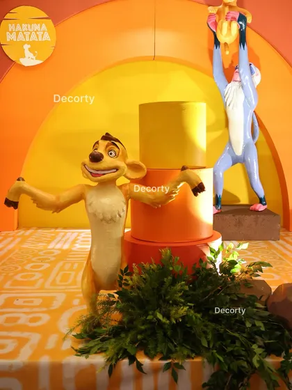 A detailed close-up of the Timon and Rafiki figures on the stage, showcasing their quality and expressions.