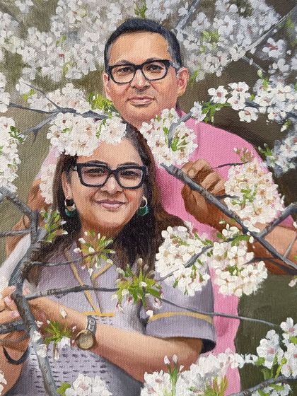 A couple's portrait set amidst beautiful white cherry blossoms. This painting has a lovely, fresh, and romantic feel, perfect for celebrating a special relationship.