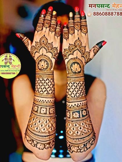 A stunning back-of-hand design featuring lotus mandalas and intricate geometric patterns. This is a popular choice for brides and bridesmaids who want a stylish look.