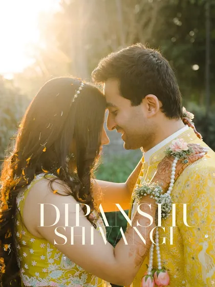A sun-kissed Haldi portrait where the couple shares a quiet moment of connection. The golden hour light beautifully complements the yellow tones of the ceremony, creating a warm and romantic photograph.