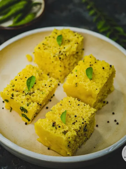 DHOKE to bahut kha liye, ab thoda DHOKLA khalo. Our light and spongy Khaman Dhokla, tempered with mustard seeds and curry leaves, is a healthy and delicious snack.