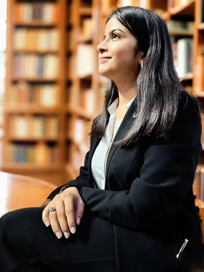 Surrounded by a sea of knowledge in the library. This is where I dive deep into research and case law to bring you clear, accurate, and simplified legal insights.