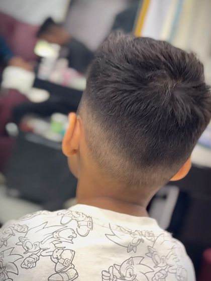 A close-up of a fade on one of our youngest clients. Even little guys deserve big style.