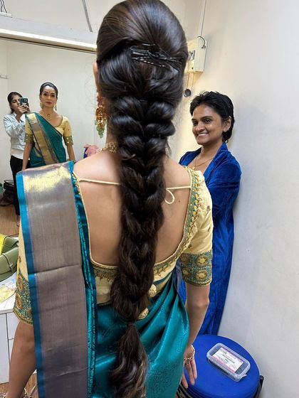 Traditional hairstyling is a key part of my service. Here you can see a classic, sturdy braid that is designed to stay intact through vigorous movements, spins, and jumps.