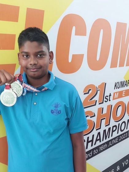 Jonathan with his two individual silver medals won in the 10M Air Pistol event at the KSS Competition in Bhopal.