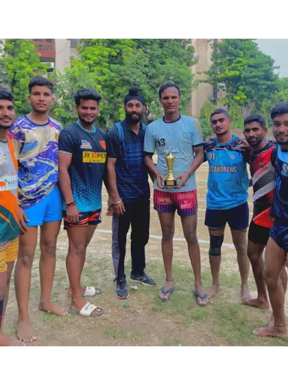A group of our senior players with the first-place trophy from the Gazipur district tournament.