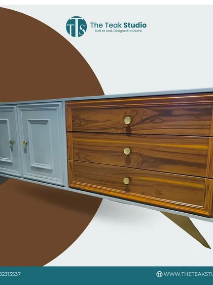 This dual-tone cabinet showcases a beautiful contrast between classic panelled doors in a soft grey finish and natural teak wood drawers. The elegant legs and simple hardware complete the transitional design.