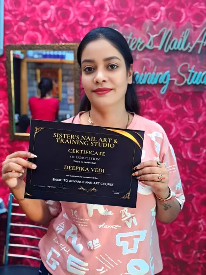 Deepika Vedi looking happy after receiving her nail art course completion certificate. We are so proud of her dedication throughout the training program.