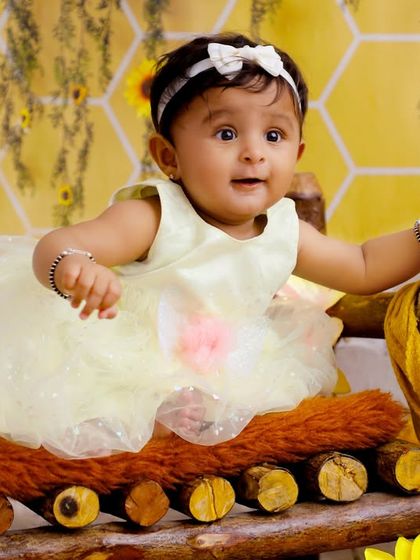 This little princess is enjoying her time in our popular honeycomb-themed setup. The combination of the rustic bed and glowing lantern creates a cozy and whimsical feel.