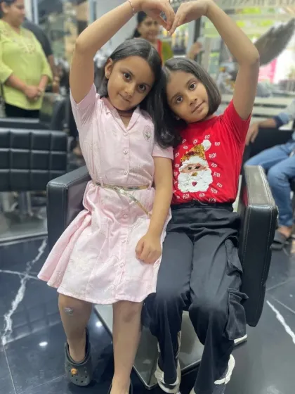A great haircut experience is for everyone, including the little ones. I make sure kids feel comfortable and have fun, leaving with a cute, stylish haircut and a big smile. Here are two happy sisters showing off their fresh new bobs.