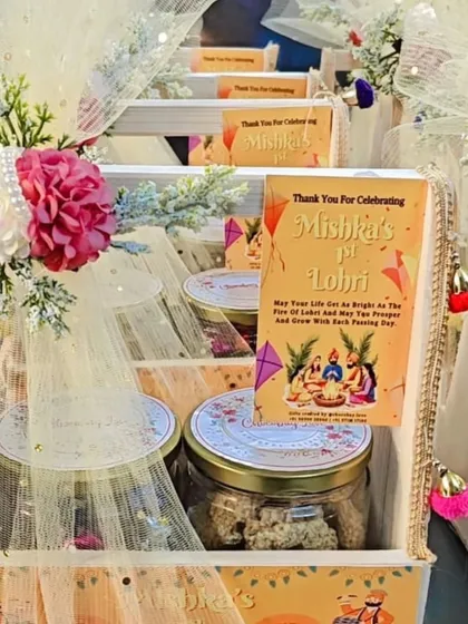 Celebrating "Mishka's 1st Lohri" with this elegant wooden tray hamper. It includes jars of treats and a personalized thank you card.