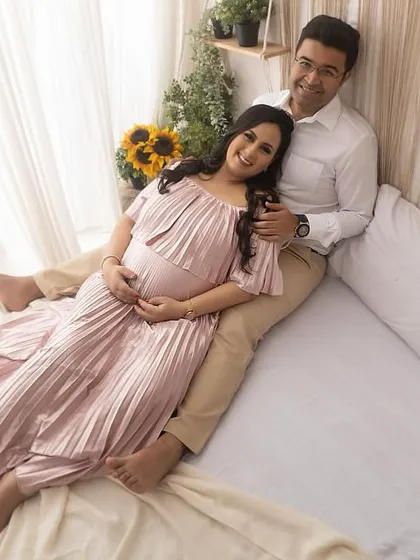 A relaxed and happy couple portrait on our lifestyle bed setup. They look so comfortable and in love, creating a photo that feels both natural and beautifully composed.