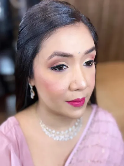 This is the sister of the bride, looking effortlessly beautiful. I gave her a soft, natural makeup look with a hint of pink on the lips and cheeks to give her a fresh and youthful glow for the wedding festivities.