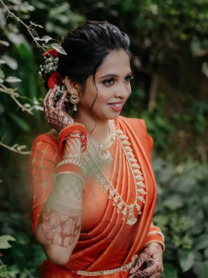 A beautiful bridal portrait of Akshata, surrounded by natural greenery. I love finding the perfect light and background to make my brides shine.