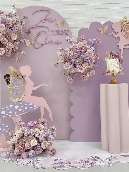 I love playing with unique color palettes to create an enchanting atmosphere. This "Lavender Angel Land" theme for a first birthday uses soft purples, fairy silhouettes, and whimsical mushrooms to craft a magical world for your little one.