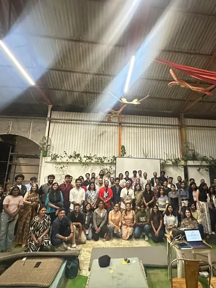 A powerful photo from our "Here to Hear" event, where 15 speakers shared their stories to promote community mental health. The event concluded with a gratitude exercise and a curated music session.